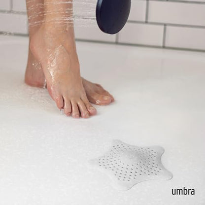 Umbra Starfish Hair Catcher, Suction Cup Drain Cover, 6-Inch, White | Silicone material, flexible and durable, water resistant seal, easy to clean, rust proof, fits standard tubs - color: White