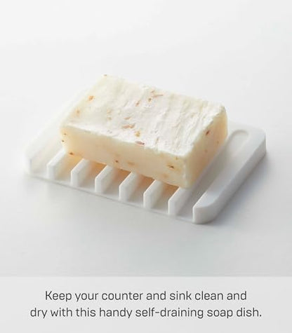 Yamazaki Home Soap Tray - Silicone Holder Dish for Sink, Silicone, No Assembly Req. | Sloped base directs water back into the sink to keep counters dry. Easy-to-clean design requires no assembly. Saves space.