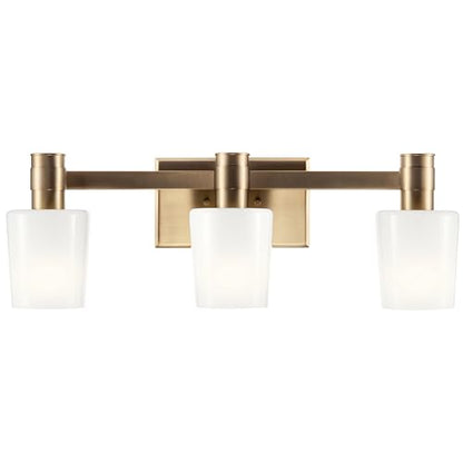 Kichler Adani 3-Light Bathroom Vanity Light, Champagne Bronze | Modern vanity light with opal glass for bathrooms and powder rooms (24" x 8.25"), 55176CPZ - color: Champagne Bronze, size: 24"