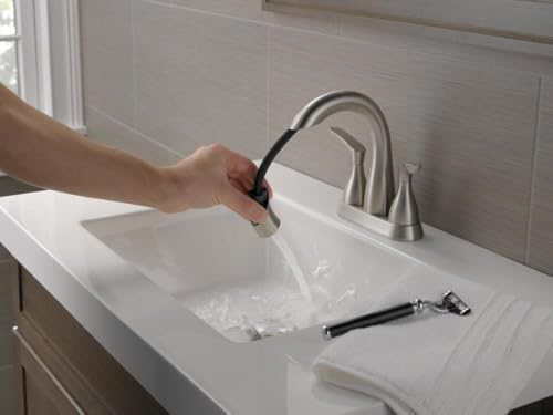 Delta Broadmoor Centerset Brushed Nickel Bathroom Faucet with Sprayer, 4 Inch 3 Hole Bathroom Sink Faucet with Pull Out Sprayer, Push-Pop Drain, Stainless 25765LF-SSPD - color: SpotShield Stainless