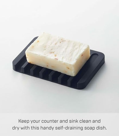 YAMAZAKI Home Flow Soap Tray - Silicone Holder Dish for Sink - Silicone | Sloped base directs water back into the sink to keep counters dry. Easy-to-clean design requires no assembly. Saves space.