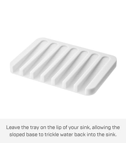 Yamazaki Home Soap Tray - Silicone Holder Dish for Sink, Silicone, No Assembly Req. | Sloped base directs water back into the sink to keep counters dry. Easy-to-clean design requires no assembly. Saves space.