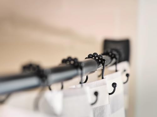Moen Triva Matte Black Adjustable 48 to 72-Inch Curved Shower Curtain Rod, CSR2169BL