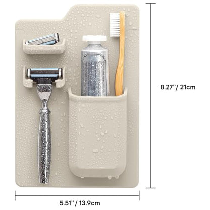 TOOLETRIES The Harvey Toothbrush & Razor Holder - Sand | Silicone bathroom organiser with a reusable adhesive mount for toothbrushes, toothpaste and razors.