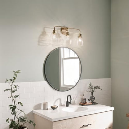 Kichler Meller 24.25" 3-Light Bathroom Vanity Light Fixture with Clear Glass Shades in Champagne Bronze for Mirror or Powder Room (24.25" W x 11.25" H x 7" D) 55102CPZ - color: Champagne Bronze, style: 3 Light