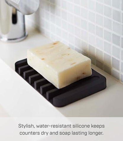 YAMAZAKI Home Flow Soap Tray - Silicone Holder Dish for Sink - Silicone | Sloped base directs water back into the sink to keep counters dry. Easy-to-clean design requires no assembly. Saves space.