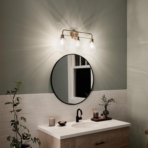 Kichler Meller 24.25" 3-Light Bathroom Vanity Light Fixture with Clear Glass Shades in Champagne Bronze for Mirror or Powder Room (24.25" W x 11.25" H x 7" D) 55102CPZ - color: Champagne Bronze, style: 3 Light