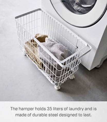Yamazaki Home Rolling Laundry Basket, Short, Wheeled Hamper, Steel, White | Small metal laundry hamper cart features smooth-rolling wheels and a convenient built-in handle. Suits modern home storage. - color: White