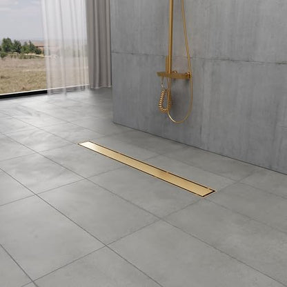 Kingston BSF2827 Stainless Steel Linear Shower Drain, Brushed Brass | Watercourse collection; With reversible tile insert and flat grate; Stainless steel construction for long lasting performance - color: Brushed Brass
