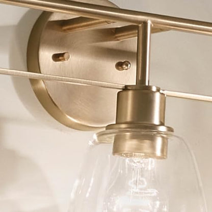 Kichler Meller 24.25" 3-Light Bathroom Vanity Light Fixture with Clear Glass Shades in Champagne Bronze for Mirror or Powder Room (24.25" W x 11.25" H x 7" D) 55102CPZ - color: Champagne Bronze, style: 3 Light