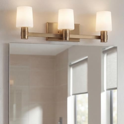 Kichler Adani 3-Light Bathroom Vanity Light, Champagne Bronze | Modern vanity light with opal glass for bathrooms and powder rooms (24" x 8.25"), 55176CPZ - color: Champagne Bronze, size: 24"