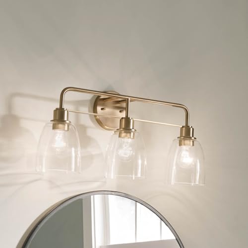 Kichler Meller 24.25" 3-Light Bathroom Vanity Light Fixture with Clear Glass Shades in Champagne Bronze for Mirror or Powder Room (24.25" W x 11.25" H x 7" D) 55102CPZ - color: Champagne Bronze, style: 3 Light