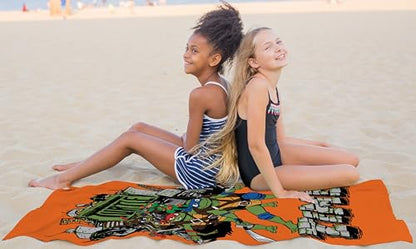 Jay Franco Nickelodeon Teenage Mutant Ninja Turtles Bath Pool Beach Towel - Kids Super Soft & Absorbent 100% Cotton Towel with Leonardo and Michaelangelo, Measures 28 x 58 - color: Orange - Tmnt