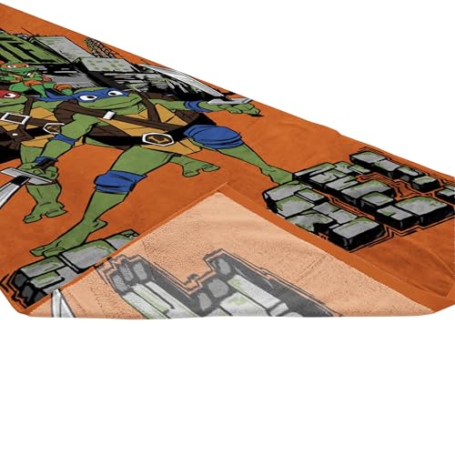 Jay Franco Nickelodeon Teenage Mutant Ninja Turtles Bath Pool Beach Towel - Kids Super Soft & Absorbent 100% Cotton Towel with Leonardo and Michaelangelo, Measures 28 x 58 - color: Orange - Tmnt