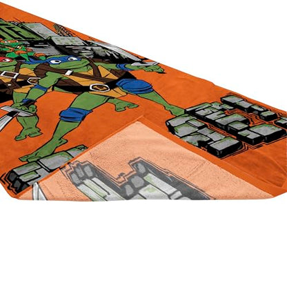 Jay Franco Nickelodeon Teenage Mutant Ninja Turtles Bath Pool Beach Towel - Kids Super Soft & Absorbent 100% Cotton Towel with Leonardo and Michaelangelo, Measures 28 x 58 - color: Orange - Tmnt