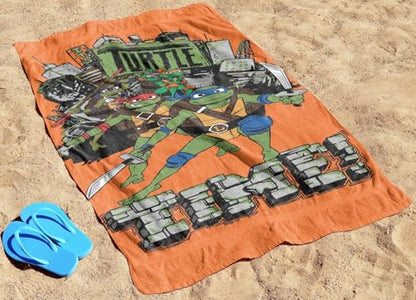 Jay Franco Nickelodeon Teenage Mutant Ninja Turtles Bath Pool Beach Towel - Kids Super Soft & Absorbent 100% Cotton Towel with Leonardo and Michaelangelo, Measures 28 x 58 - color: Orange - Tmnt