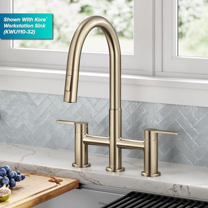 KRAUS Oletto Bridge Kitchen Faucet with Pull-Down Sprayhead in Spot-Free Antique Champagne Bronze, KPF-3122SFACB - color: Spot Free Antique Champagne Bronze, style: Bridge Faucet