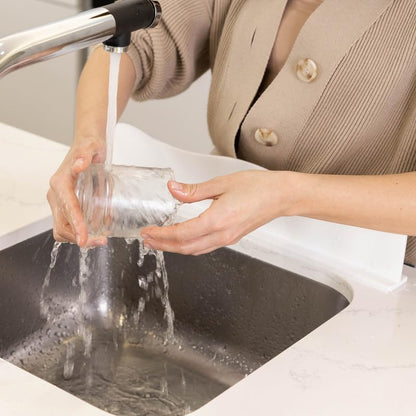 TYOARO Sink Splash Guard Behind Faucet for Kitchen, Silicone Non-Slip Base | Non-slip suction base, fits kitchen and bathroom sinks, dishwasher safe - color: Bright White