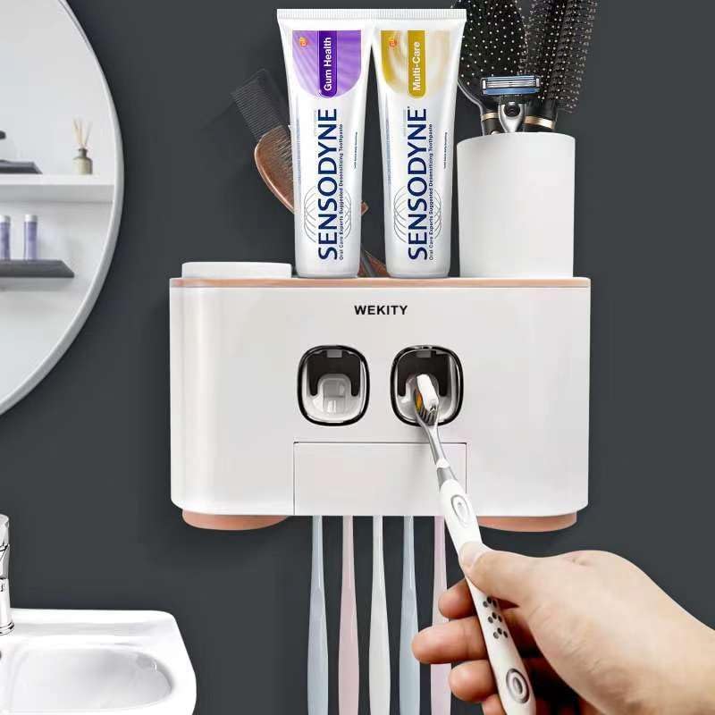 Toothbrush Holder Wall Mounted, WEKITY Multi-Functional Toothbrush and Toothpaste Dispenser for Bathroom, with 5 Toothbrush Slots, 2 Toothpaste Squeezers and 4 Cups(Pink) - color: Pink