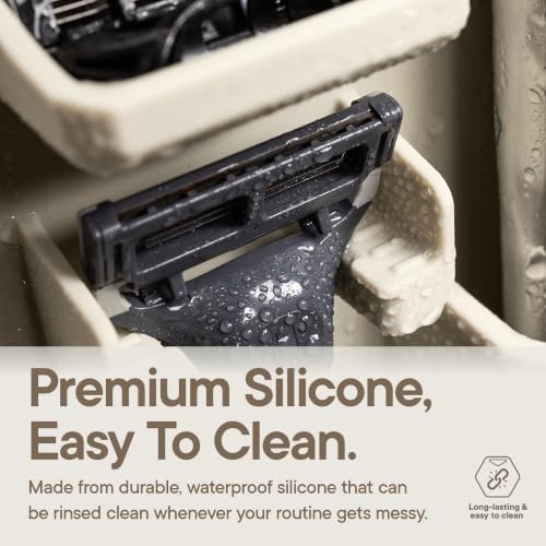 TOOLETRIES The Harvey Toothbrush & Razor Holder - Sand | Silicone bathroom organiser with a reusable adhesive mount for toothbrushes, toothpaste and razors.
