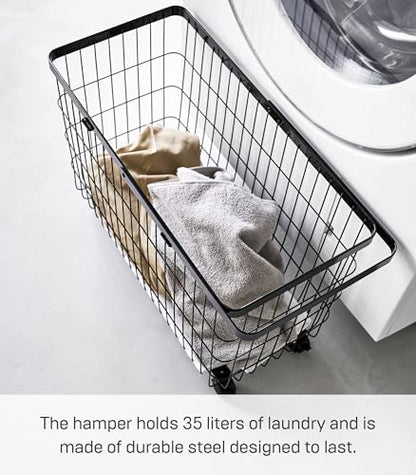 Yamazaki Home Tower Small Rolling Laundry Basket Metal Hamper Cart With Wheels And Handle, 14.8" - Steel - 9.8 Gallons, 35 Liters | Small metal laundry hamper cart features smooth-rolling wheels and a convenient built-in handle. Suits modern home storage.